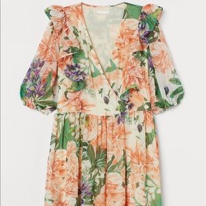 Ruffle-trimmed dress with a large floral print